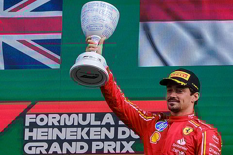 Dutch Grand Prix 2024: Ferrari driver Charles Leclerc of Monaco celebrates on the podium after placing third